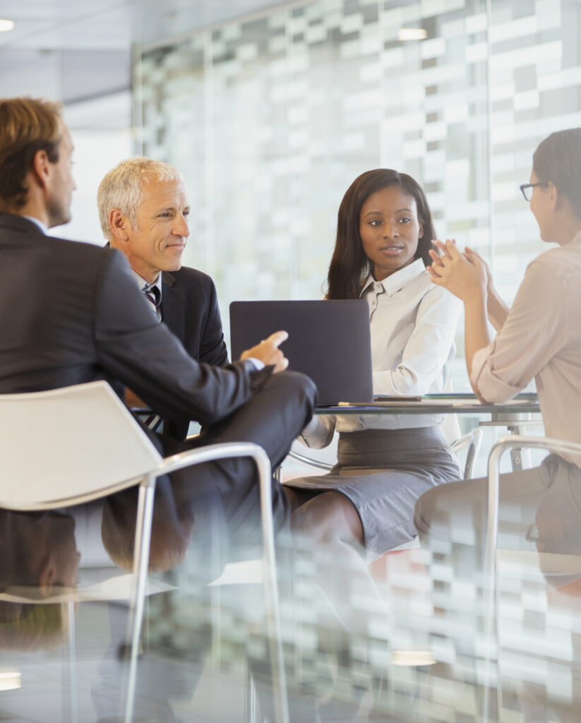 Business people talking in meeting in office building