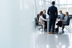 Corporate business team and manager in a meeting, close up